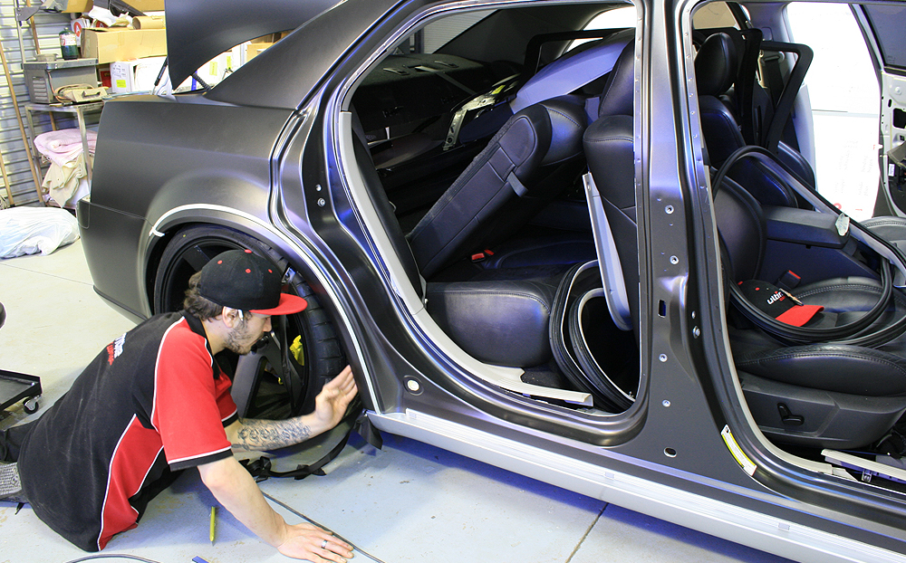 Door jambs being wrapped in Avery Supreme Wrap Film - Ultimate Car Wraps  Warrnambool